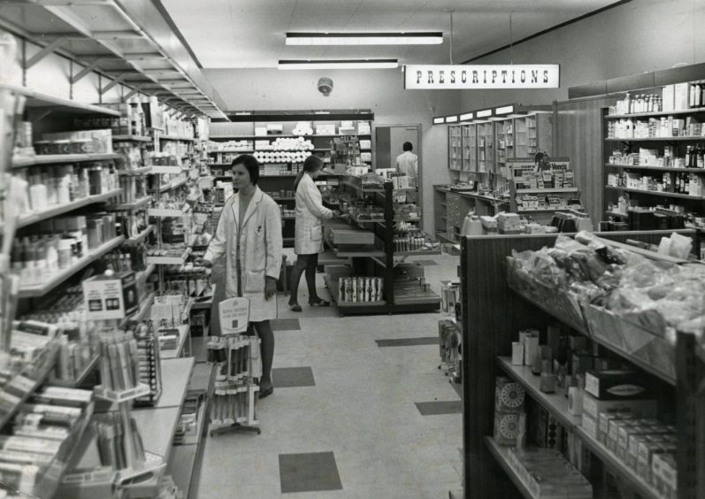 staff inside the Charles Allardyce healthcare shop in the Overgate in Dundee in December 1969.