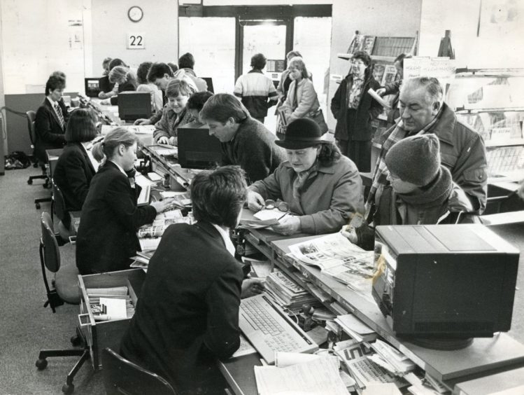 A busy travel agent in Dundee. 