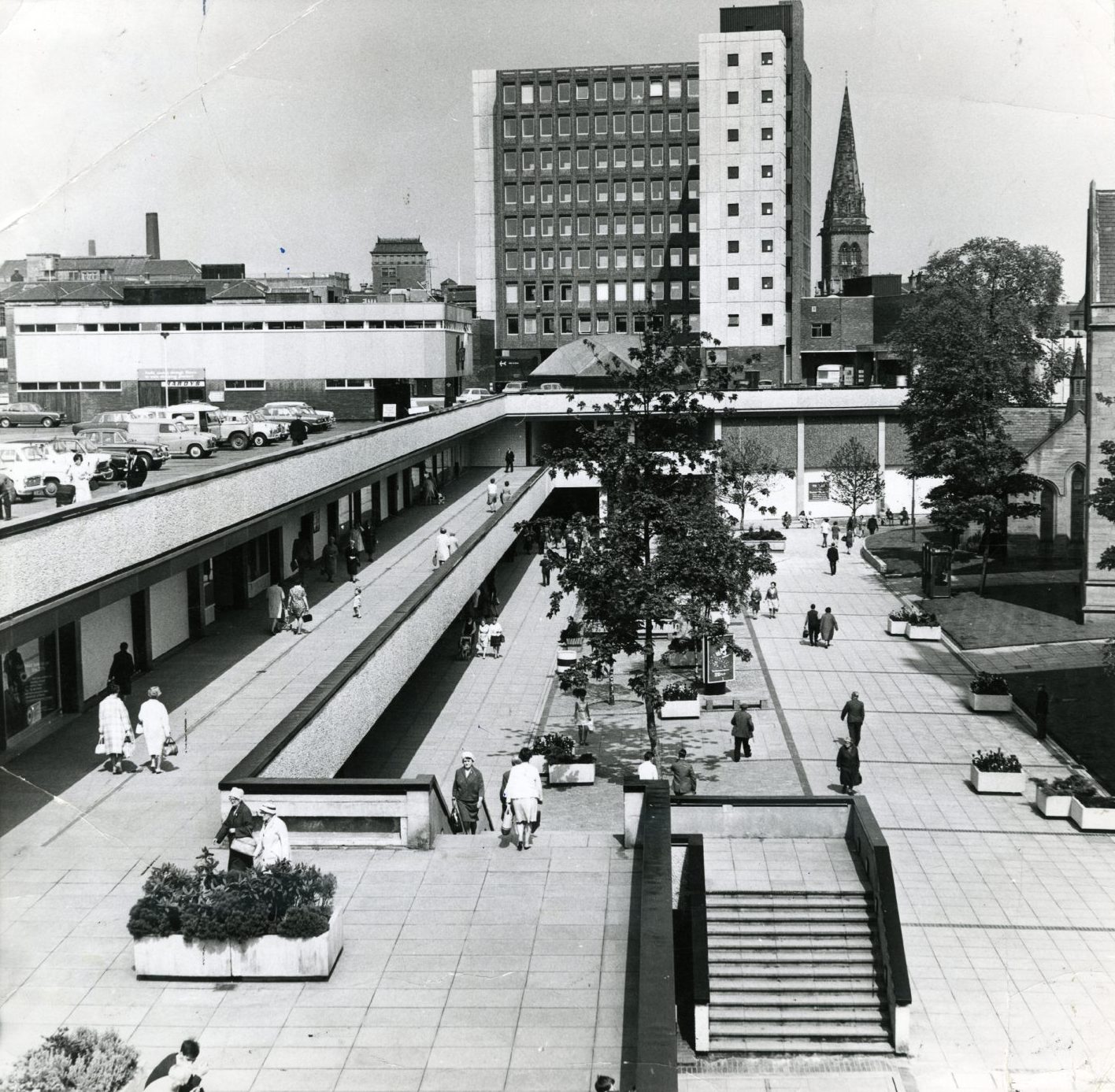 an aerial shot showing people strolling the walkways of the Overgate in June 1970. 