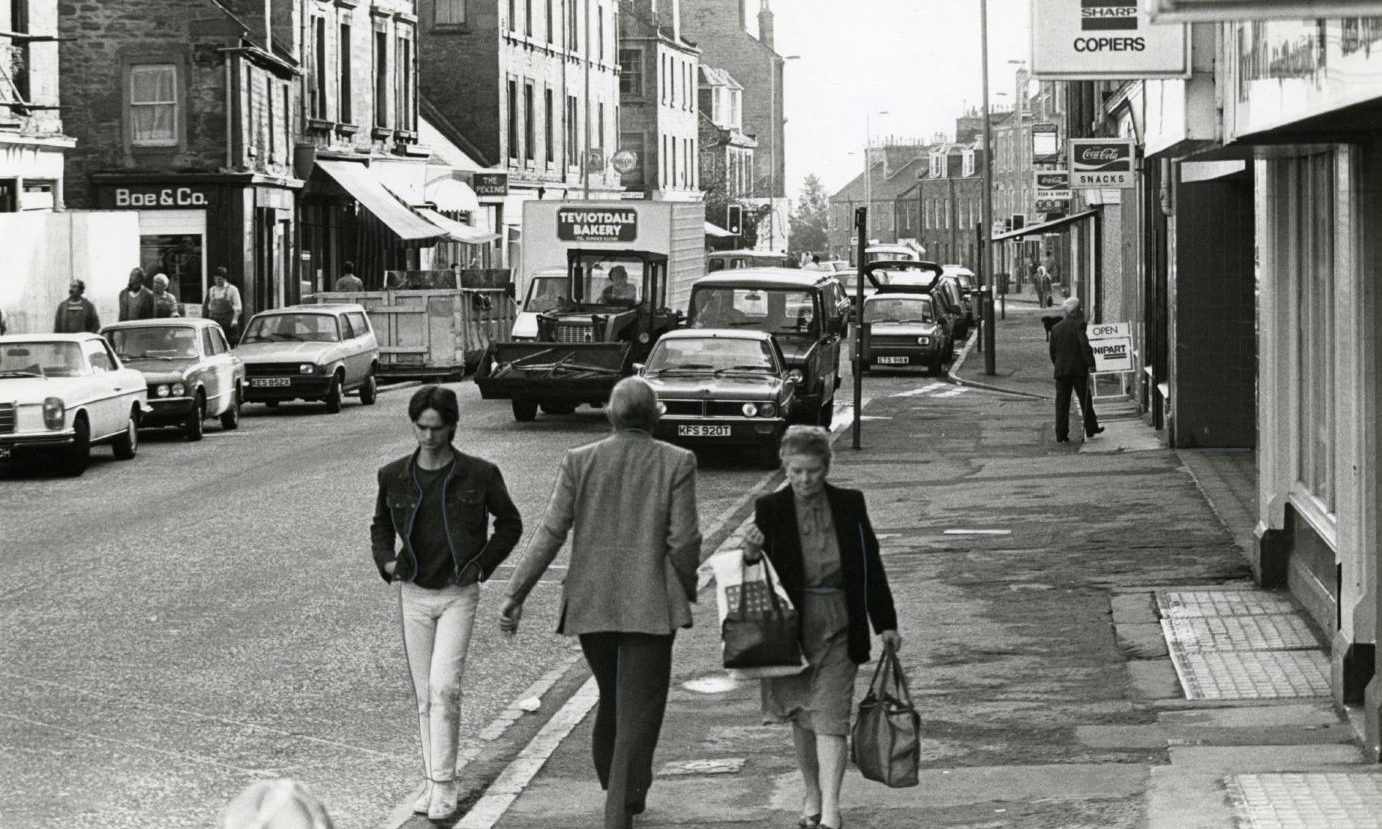 Pedestrians and shopfronts in this picture of the Perth Road in Dundee in September 1985.