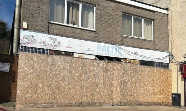 Police made the discovery in a flat above the vacant shop in Kirkcaldy.