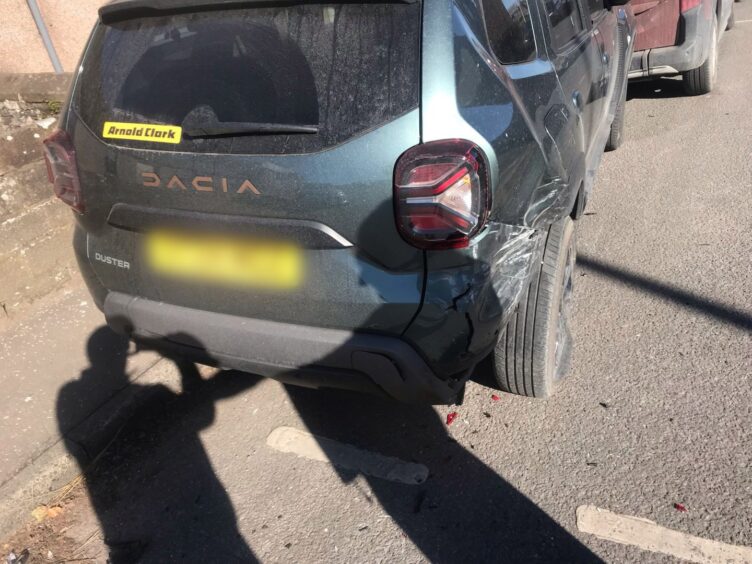 Damaged car on Dundee Road in Forfar.