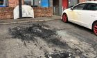 A white Seat has been damaged and debris left behind on Turnberry Avenue, Ardler, Dundee.