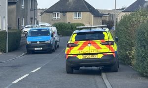 Police on George Street in Cowdenbeath. Image: Neil Henderson/DC Thomson