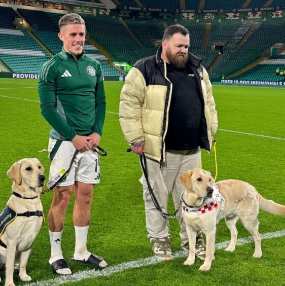 The duo alongside Celtic's Luke McCowan earlier this season