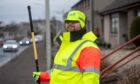 Dean Robertson on crossing patrol at Dundee Road. Image: Kim Cessford/DC Thomson