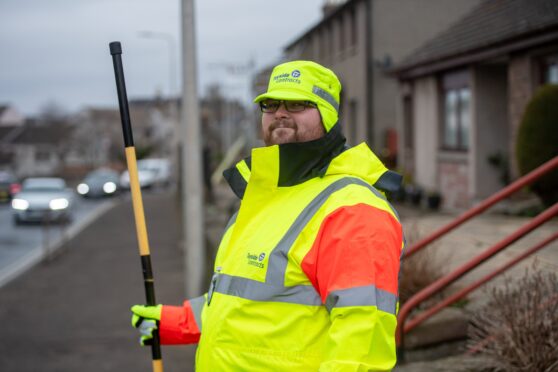 Dean Robertson on crossing patrol at Dundee Road. Image: Kim Cessford/DC Thomson