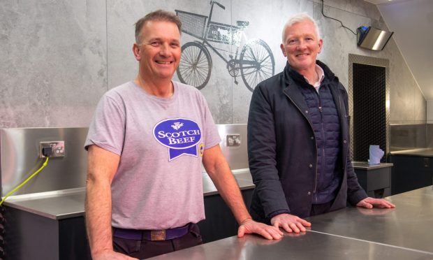 Scott Brothers owners George and Scott Jarron in the new shop.  Image: Kim Cessford / DC Thomson
