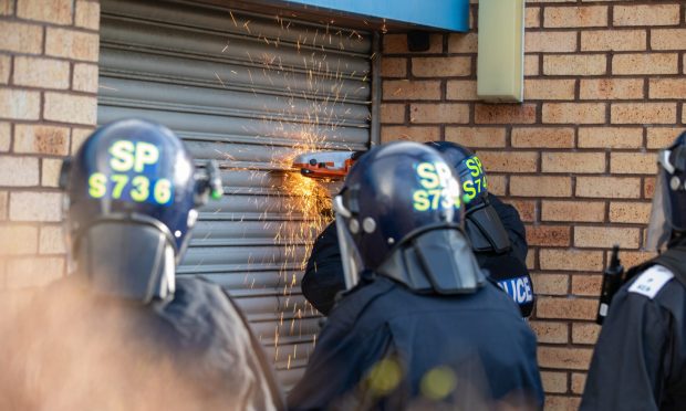 CR0052194, Neil Henderson, Glenrothes. Police Drugs Raid. Picture shows; Police today executed a warrant on an address in Glenrothes where a large Cannabis Farm was found.
Thursday 6th March 2025. Image: Kenny Smith/DC Thomson