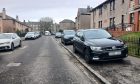 Motorists risk £100 fines for parking their vehicles on pavements in Dundee. Image: Finn Nixon/DC Thomson