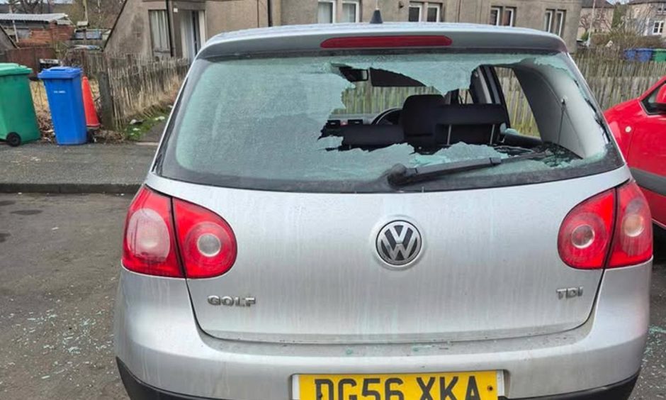 The smashed rear window of Methil woman Samantha Jamieson's Volkswagen Golf.