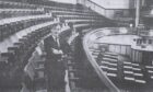 Mike Davison beside the seats at the Alhambra theatre in 1985.