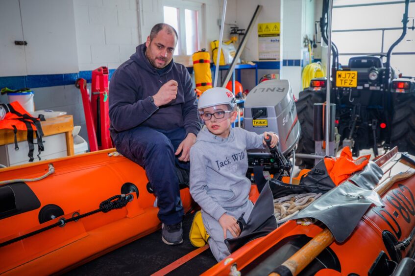 AJ and mechanic Kevin Calder at Anstruther Lifeboat station