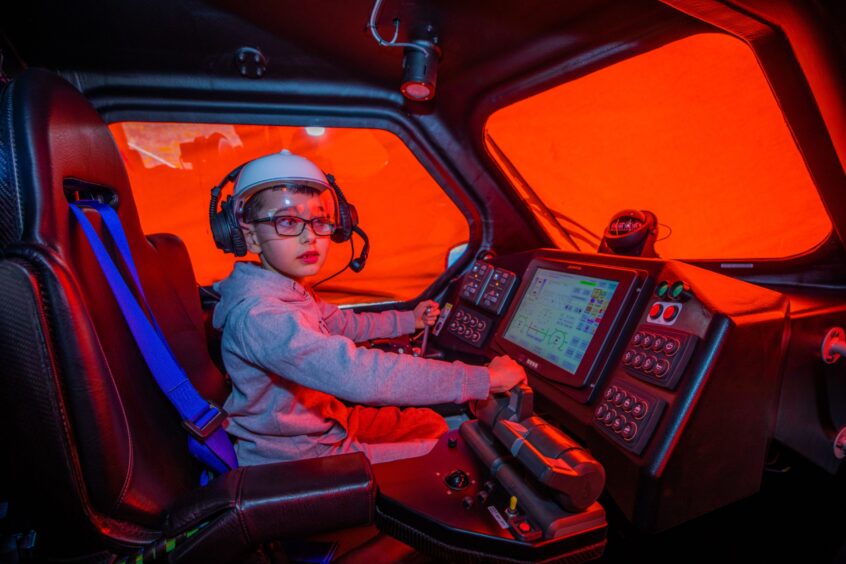 AJ at the helm of Anstruther lifeboat's new Shannon class all-weather boat