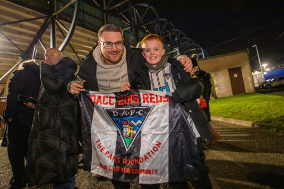 Dunfermline fans Gary Weymss and son Rudy Weymss (aged 9).