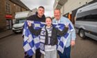 Mia McKenzie (aged 10) with dad Scott McKenzie (left) and grandad Alan McKenzie (right) Image: Steve MacDougall/DC Thomson