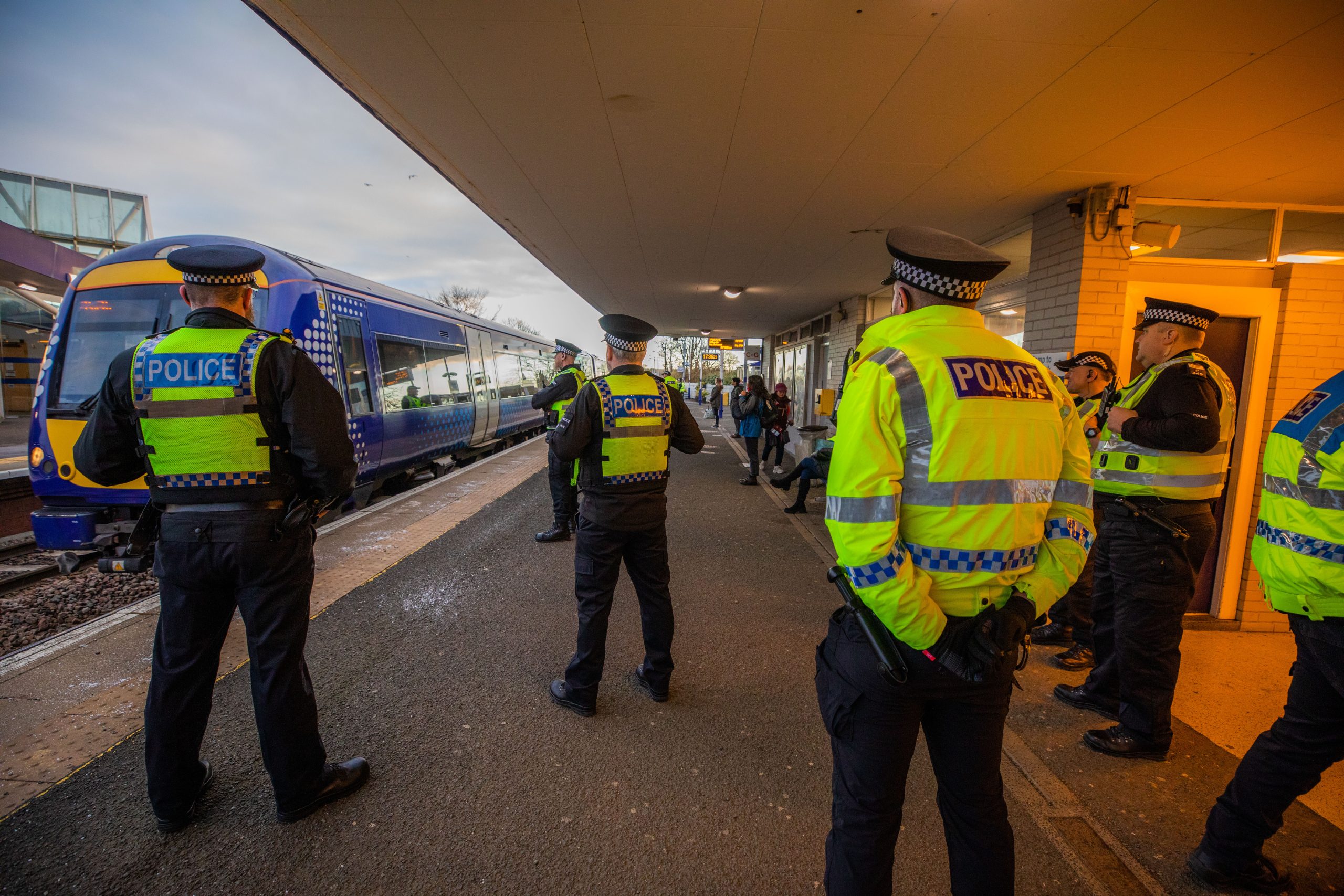 Officers await arrival of Dunfermline fans at Kirkcaldy train station.