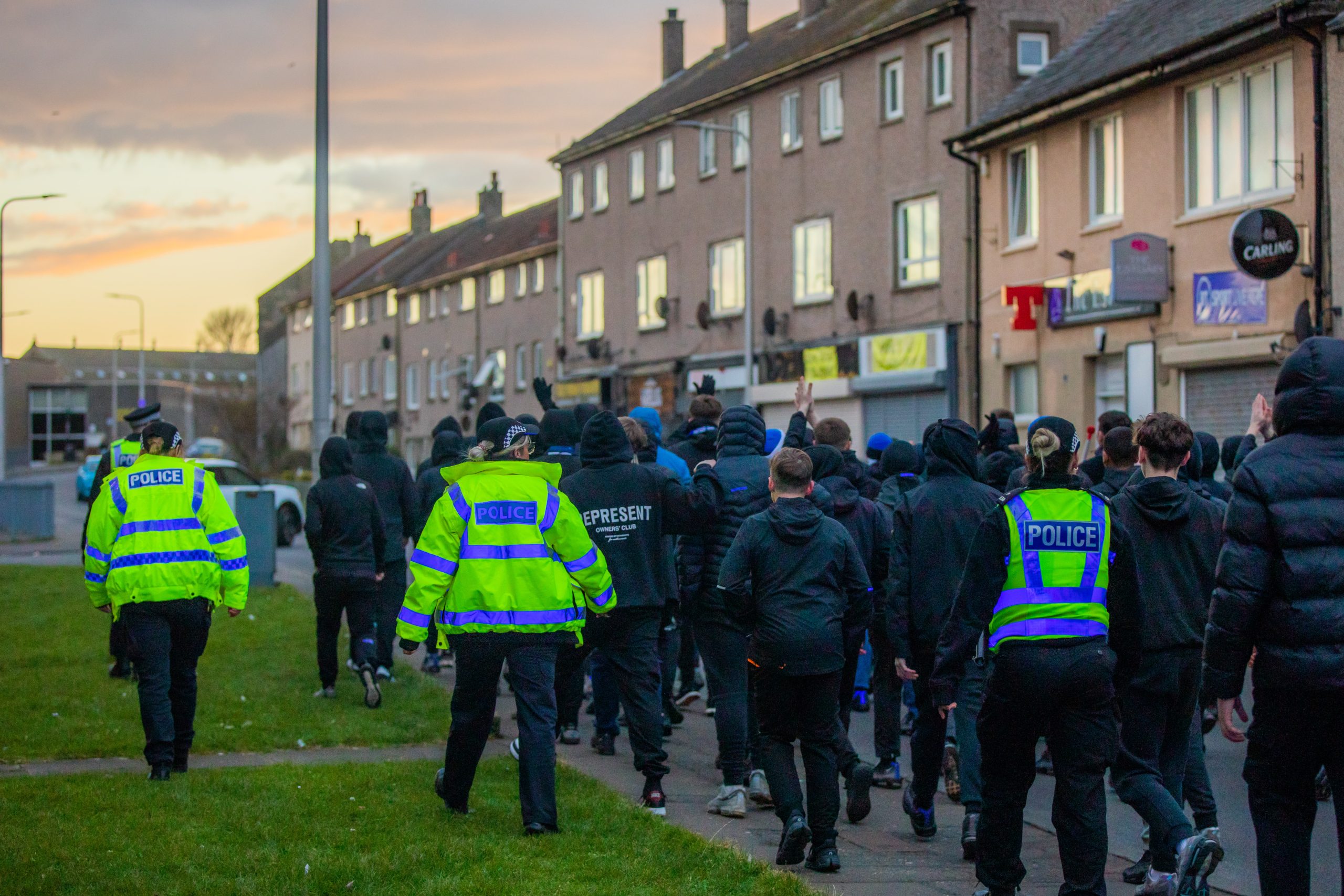 Raith fans escorted along Link Street in Kirkcaldy.