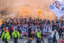 Dundee United fans march to Tannadice Stadium, Dundee. Image: Steve MacDougall/DC Thomson