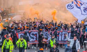 Dundee United fans march to Tannadice Stadium, Dundee. Image: Steve MacDougall/DC Thomson