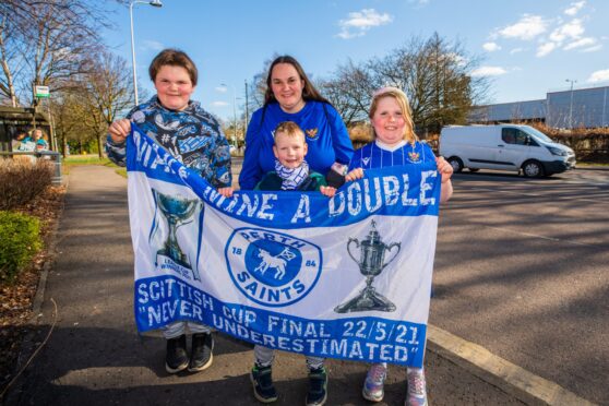 Vivian Small at the back alongside son Jamie Small (aged 11, left), daughter Chloe Small (aged 9, right) and nephew Andrew Gemmell (aged 6, centre) from Perth. Image: Steve MacDougall/DC Thomson