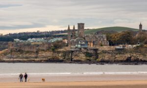 Image shows: a scenic shot of St Andrews, Fife taken from West Sands overlooking the historic town.
