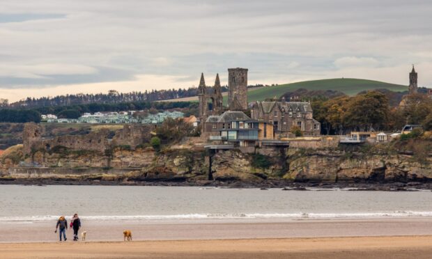 Image shows: a scenic shot of St Andrews, Fife taken from West Sands overlooking the historic town.
