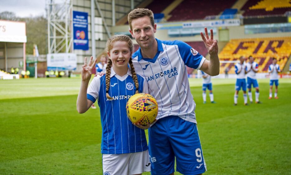 St Johnstone's Steven MacLean celebrates scoring a hat-trick in the 5-1 win against Motherwell in May 2018 with his daughter Ruby.