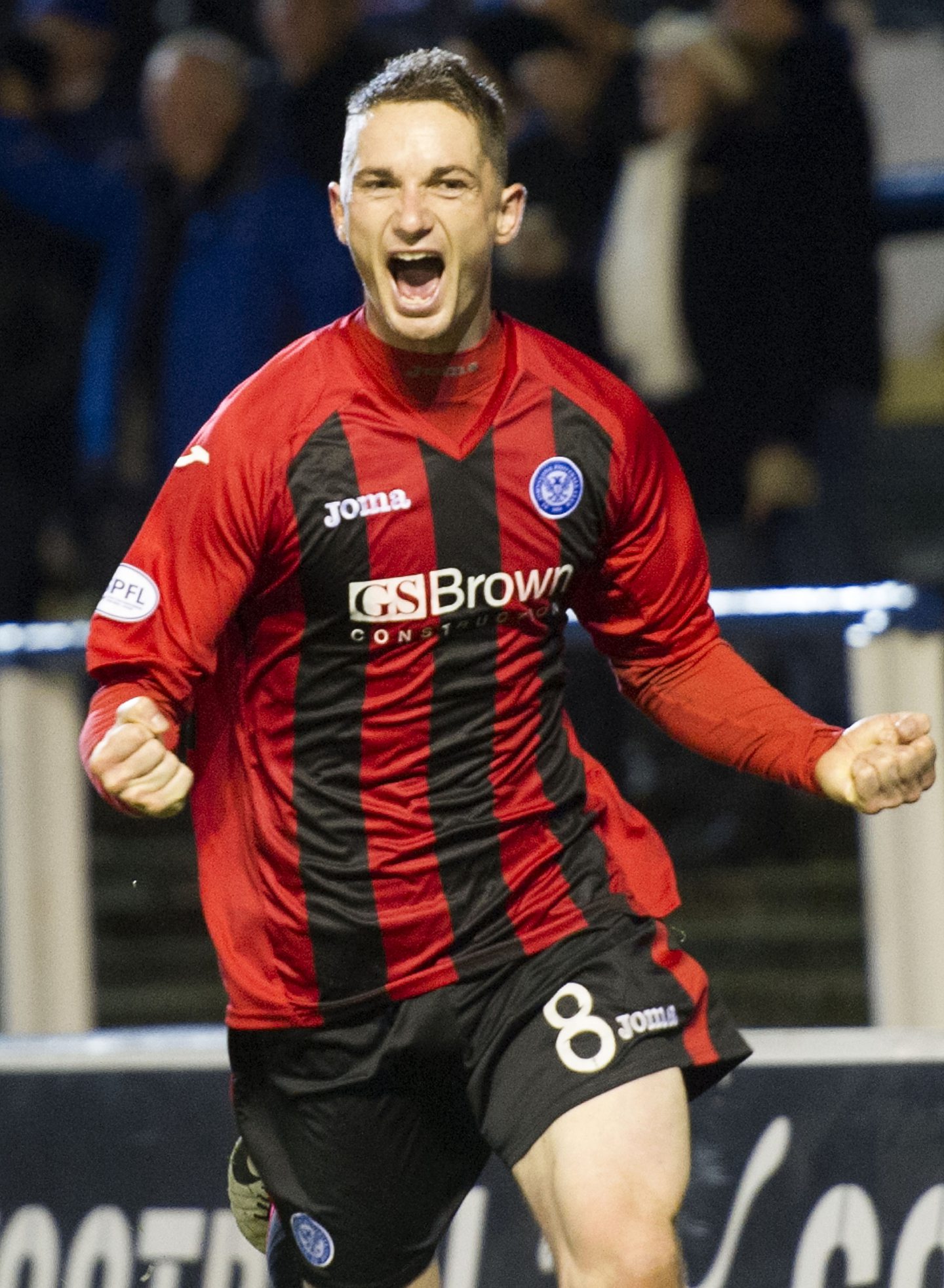Saints' Gary McDonald celebrates while in the red and black away strip