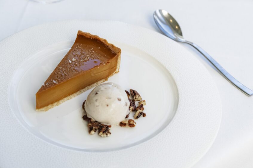 Salted caramel tart with banana and pecan ice cream to finish off dinner at The Conservatory in the Old Course Hotel in St Andrews. 