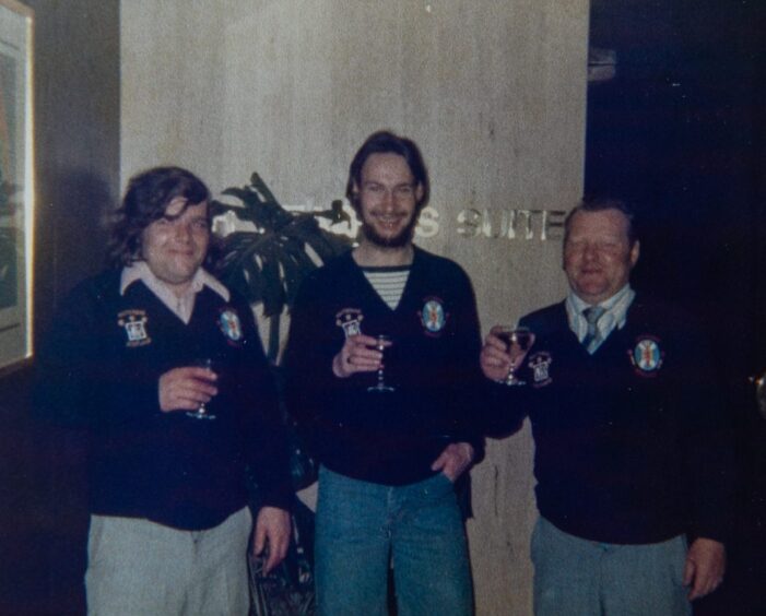 Jocky Wilson, Wullie Burness and Chic McCallum raise a glass in 1979. 