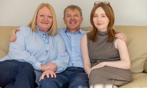 Michael Welsh with his wife Alison and their daughter Rachel (24), at home in Broughty Ferry. Alison and Rachel helped to save Michael's life when he suffered a cardiac arrest.