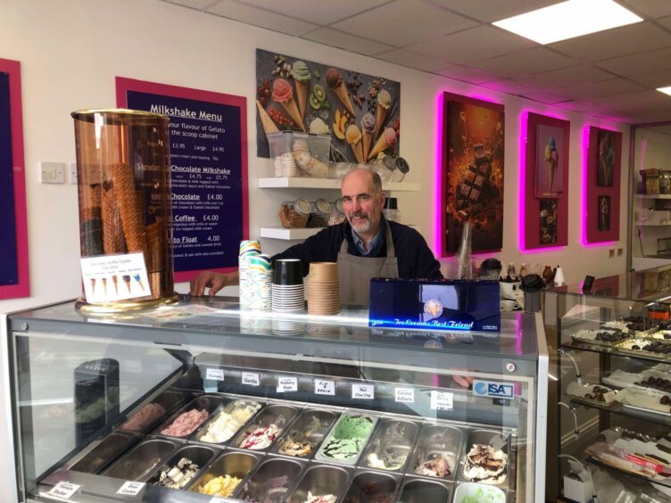 Stephen Bennett standing behind the counter at Casa di Gelato