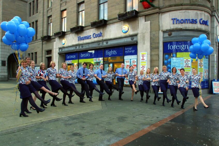 Thomas Cook staff outside the shop in City Square, Dundee, in 2003.