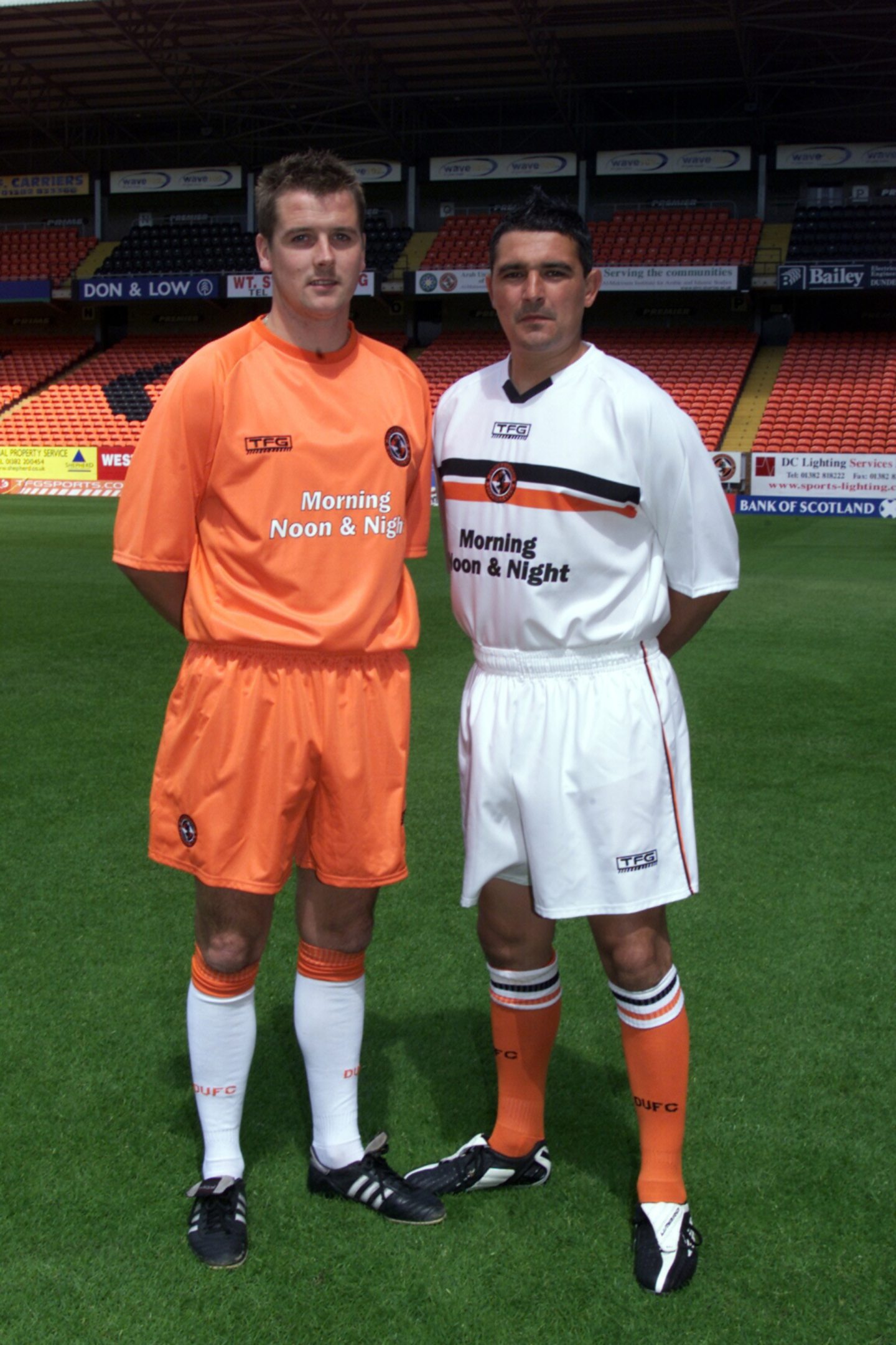 Danny Griffin and Charlie Miller pose for a picture on the Tannadice pitch in 2003