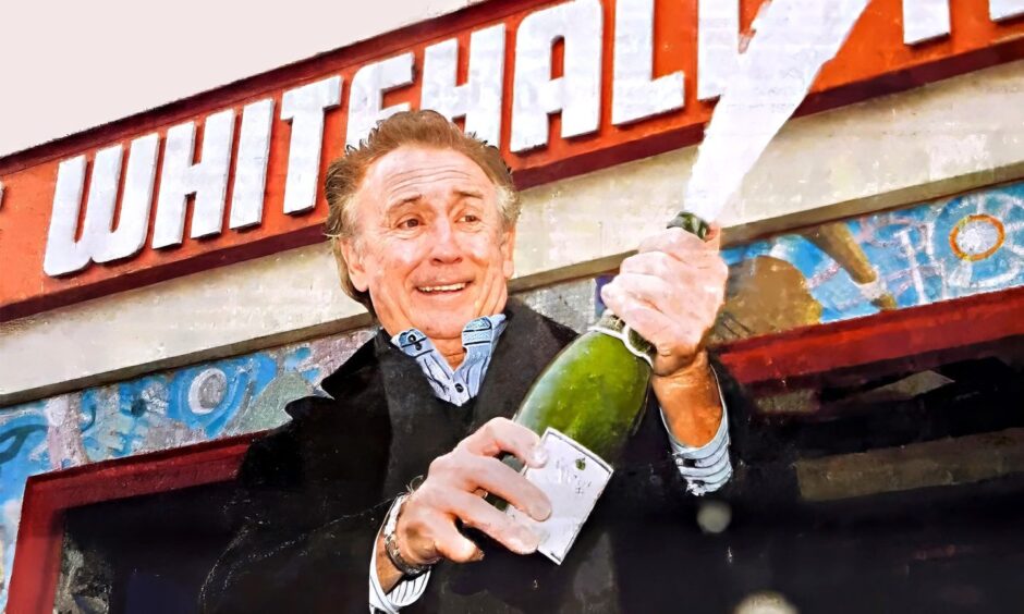 Tony Christie celebrates at the Whitehall Theatre in 2005. Image: DC Thomson.