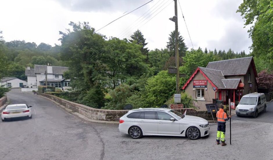 Bridge of Cally post office in traditional building on end of bridge