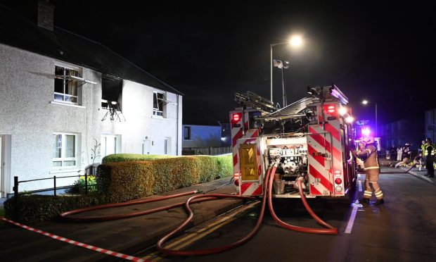 Emergency services at the fire in Perth's Drummond Crescent. Image: Stuart Cowper