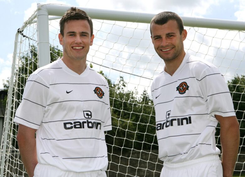 Keith Watson and Kevin Smith in the white 2009 away strip