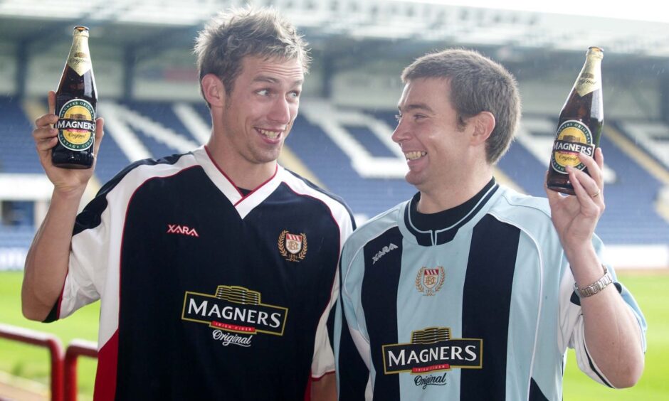 Smiling Steve Lovell and Barry Smith with bottles of cider to mark Dundee FC's shirt deal with the firm