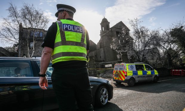 BESTPIC CR0052368, Bryan Copland, Fresh photos of the damage to the Maison Dieu church in Brechin after a major fire yesterday. Picture shows; the aftermath of the damage done to the Maison Dieu church in Brechin where police are still present. Thursday 6th March, 2025.  Image: Mhairi Edwards/DC Thomson