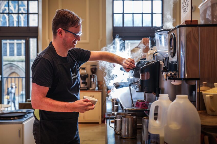 Matt Wester at machine making coffee in Perth Museum cafe