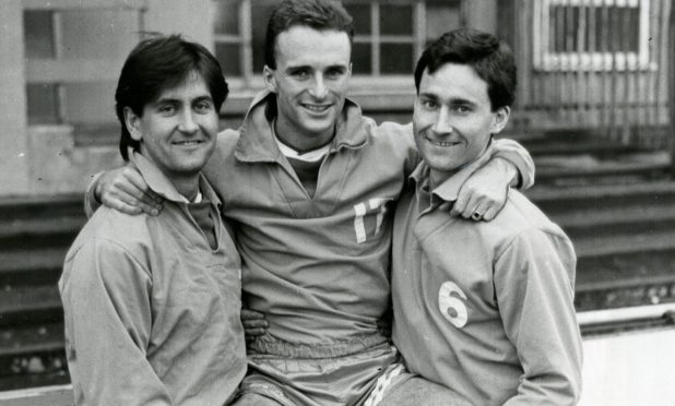 Tommy Coyle and Doug Barron carry Paul Cherry at a 1989 St Johnstone photocall.