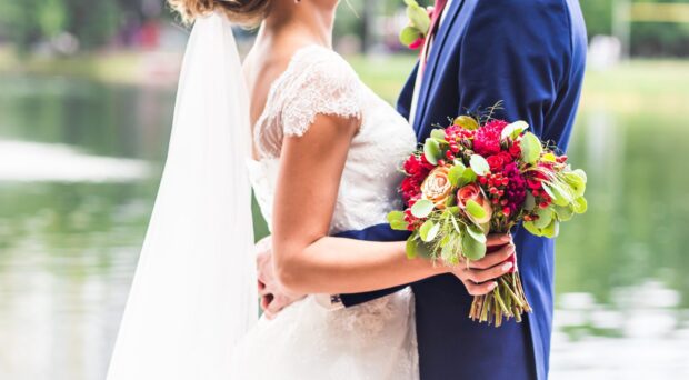 married couple with bouquet