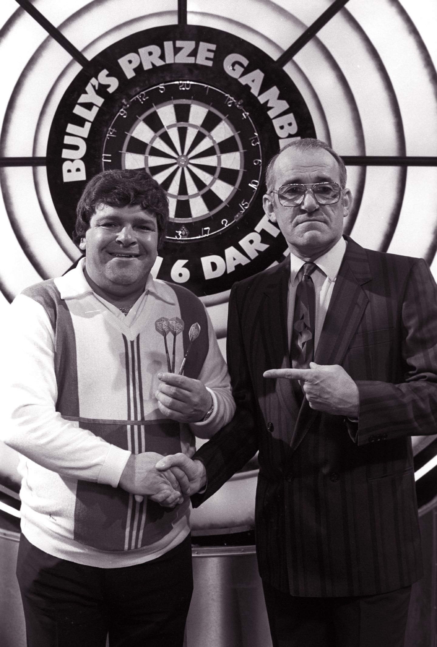 Jocky and Bullseye host Jim Bowen on set in 1986.