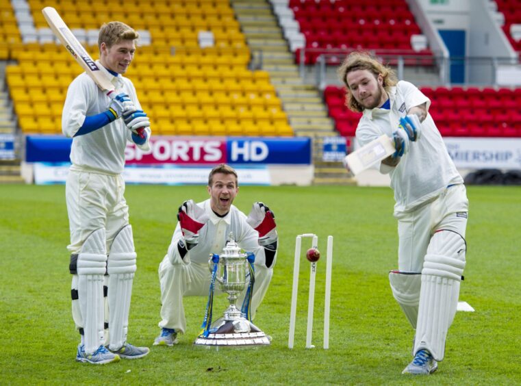 Stevie May, David Wotherspoon, Lee Croft and Chris Millar play cricket on the McDiarmid Park pitch.