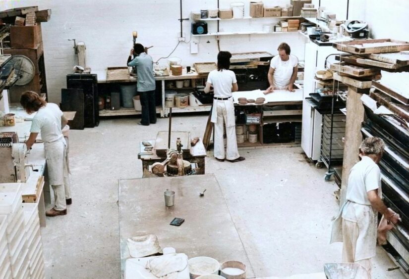 People working in Clark's in Miln Street.