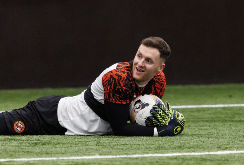 Jack Walton is all smiles in Dundee United training. 