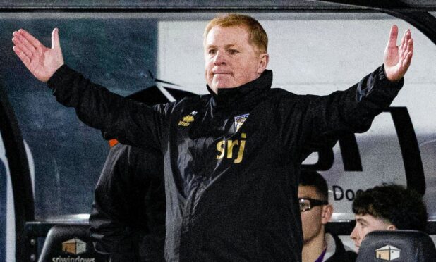 Dunfermline Athletic boss Neil Lennon stands with his arms outstretched.