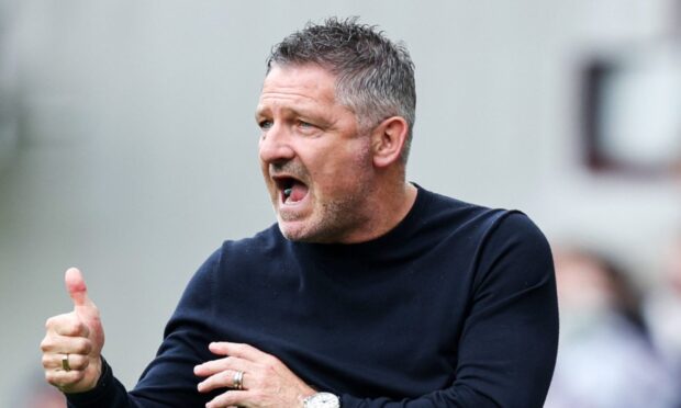 Tony Docherty praised the mentality of his Dundee side after they earned a crucial 1-0 win at Hearts. Image: Ross Parker/SNS